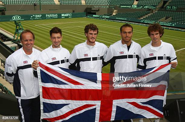 Captain John Lloyd, Alex Bogdanovic, Jamie Murray, Ross Hutchins and Andy Murray of Great Britain pose with the flag after the Draw for the Davis Cup...