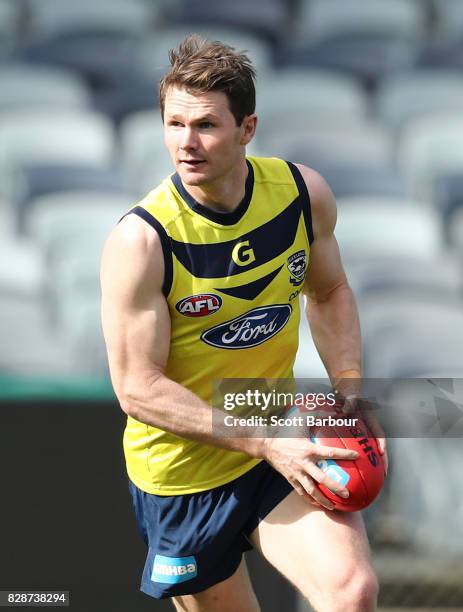 Patrick Dangerfield of the Cats runs with the ball during a Geelong Cats AFL training session at Simonds Stadium on August 10, 2017 in Geelong,...