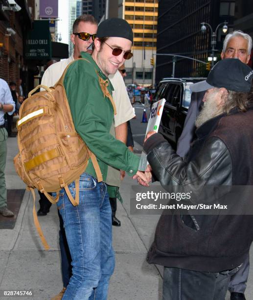 Actor Robert Pattinson and Radio Man are seen on August 9, 2017 in New York City.