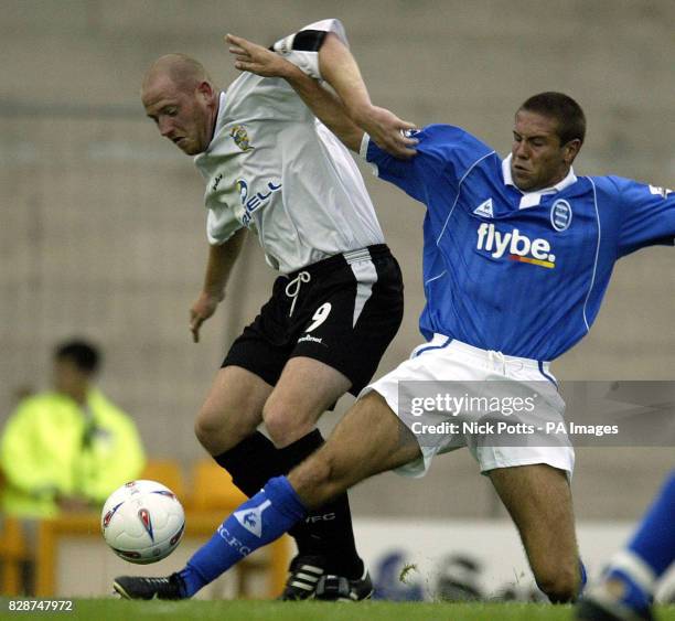 Birmingham City's Matthew Upson challenges Port Vale's Stephen Brooker, during pre-season friendly at Vale Park, Stoke on Trent. THIS PICTURE CAN...