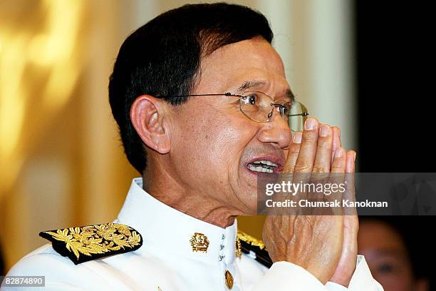 Somchai Wongsawat gives a traditional greeting before receiving the official royal command to appoint him as the new prime minister on September 18,...