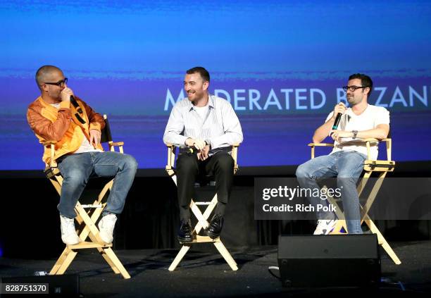 Apple Music's Beats 1's Zane Lowe, recording artist Sam Smith and singer-songwriter Jimmy Napes speak onstage during Capitol Music Group's Premiere...