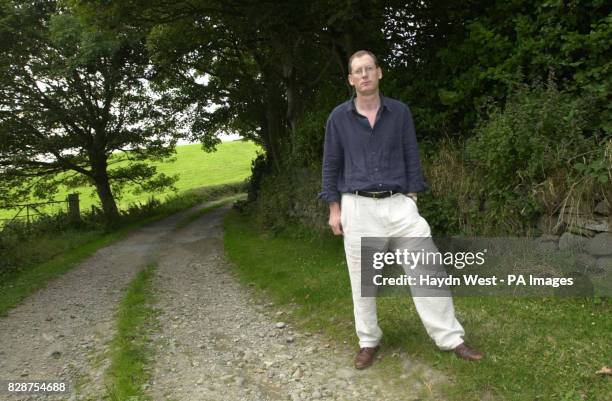 Downing Street spokesman, Tom Kelly, outside his home in Portaferry, Co Down, Northern Ireland Blair tonight faced calls to sack Kelly who suggested...