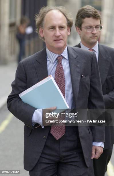 Counsel for the BBC Andrew Caldecott QC arrives at the Royal Courts of Justice for the beginning of the Hutton inquiry. The inquiry, which is being...