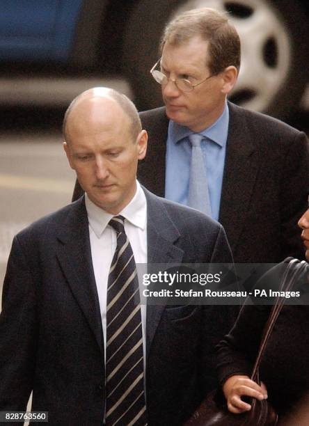 Tom Kelly and Godric Smith , the two official spokesmen for British Prime Minister Tony Blair, arrive to give evidence to the Hutton inquiry at the...