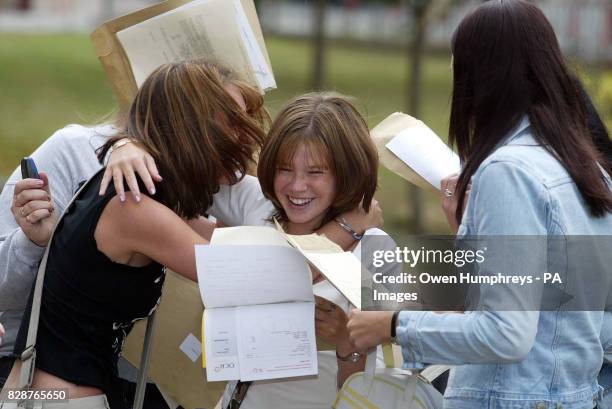 Pupils celebrate their GCSE results at Emmanuel Collage in Gateshead, Tyne and Wear where 27 pupils achieved a total of 300 A* and A grade GCSEs...