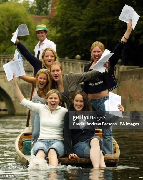 Girls from St Mary's School, Cambridge, celebrate getting their GCSE results by punting on the River Cam by King's College