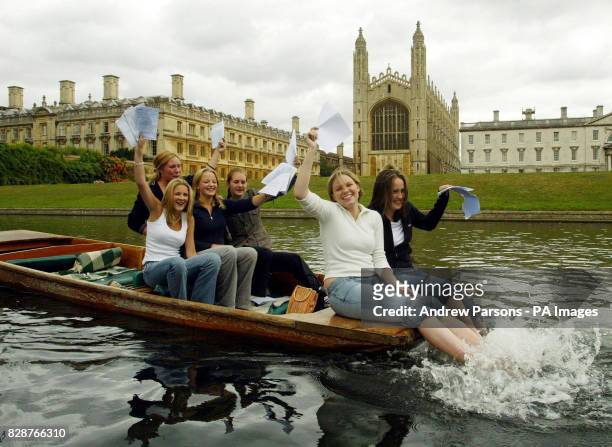 Girls From St Mary's School,Cambridge, celebrate getting their GCSE results by punting on the River Cam By King's College.