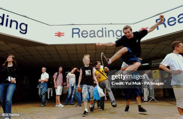 Festival goers arriving at Reading railway station for the Reading Festival, on the weekend that Network Rail have undertaken major repairs.