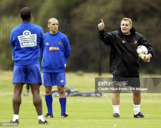 Wolverhampton Wanderers' manager Dave Jones gestures to his players during a training session at Compton training ground, Wolverhampton, Tuesday...
