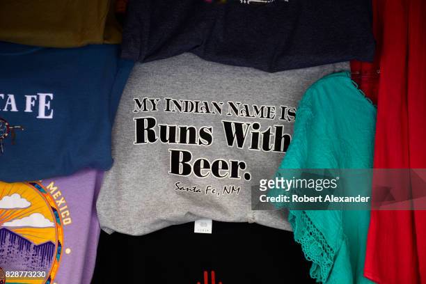 Selection of souvenir T-shirts for sale in a shop in Santa Fe, New Mexico.