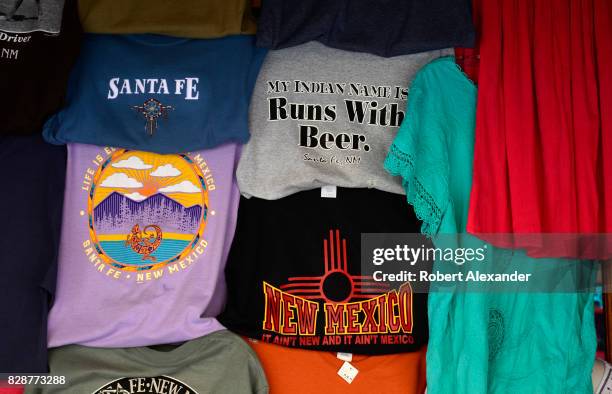 Selection of souvenir T-shirts for sale in a shop in Santa Fe, New Mexico.