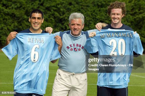 Manchester City manager Kevin Keegan with the club's new signings Claudio Reyna and Steve McManaman after a press conference at the club's Carrington...