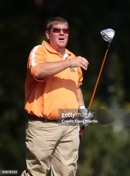 John Daly watches his drive from the 11th tee during first round play in the Viking Classic at the Annandale Golf Club on September 18, 2008 in...