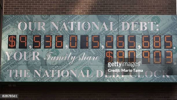 The unofficial "National Debt Clock" advertises the debt of the United States in midtown September 18, 2008 in New York City. Morgan Stanley and...