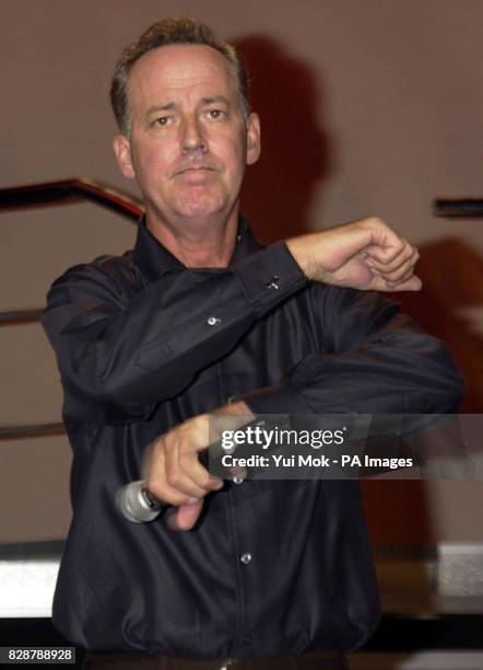 Entertainer Michael Barrymore performs on stage during a photocall for his new stand-up show Michael Barrymore: The Kings Of Comedy at the Wyndham...