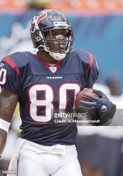 Houston Texans rookie wide receiver Andre Johnson grabs a warmup pass September 7, 2003 at Pro Player Stadium, Miami, Florida. The Texans defeated...