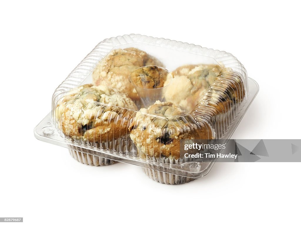 Organic muffins in plastic container