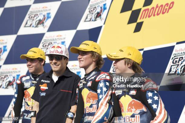 Bikers Hayden Gillim, Jacob Gagne and Austin DeHaven take the podium with MotoGP racer Nicky Hayden after the 9th round of the Red Bull Rookies Cup...