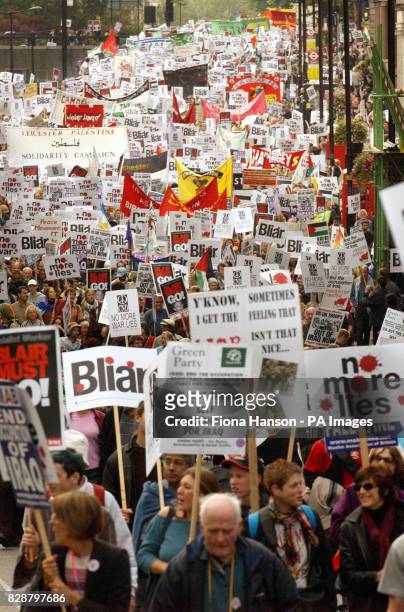 Anti-war protesters march through the streets of Piccadilly, central London, as part of the first major demonstration against the Iraq conflict since...