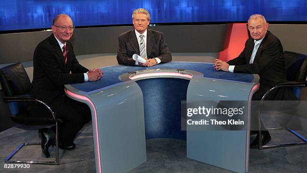 Franz Maget of the Social Democrats Party , TV host Siegmund Gottlieb and Bavaria's state governor Guenther Beckstein of the Christian Social Union...