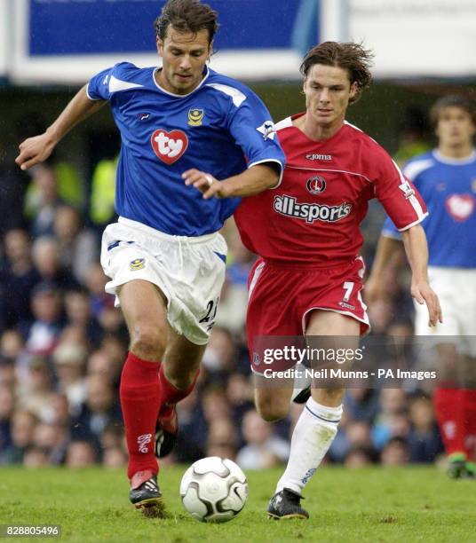 Portsmouth's Patrik Berger escapes from Scott Parker of Charlton Athletic, during their FA Barclaycard Premiership match at Portsmouth's Fratton Park...