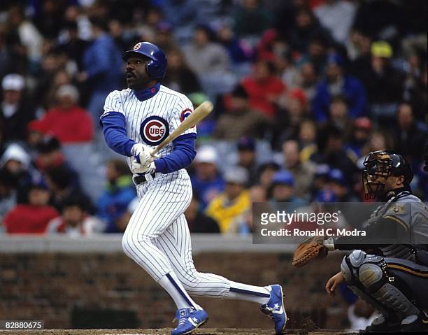 Andre Dawson of the Chicago Cubs bats during a MLB game against the Pittsburgh Pirates in Wrigley Field on April 12, 1991 in Chicago, Illinois.
