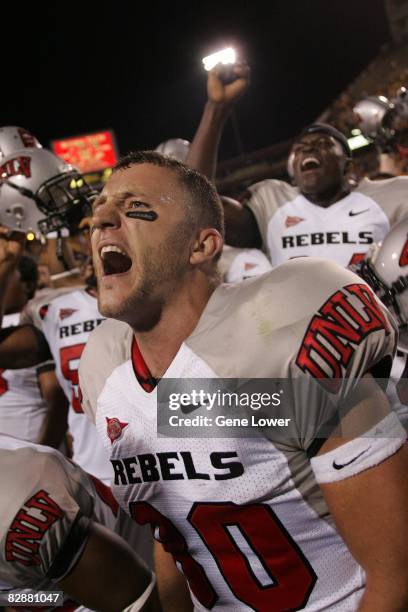 Wide receiver Casey Flair of the UNLV Rebels celebrates an overtime win against the Arizona State Sun Devils at Sun Devil Stadium in Tempe, Arizona...