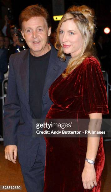 Former Beatle Paul McCartney and wife, Heather Mills-McCartney arrive for the DVD screening of "A Concert For George" at Odeon West End in central...