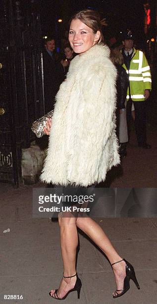 Model Kate Moss arrives at the opening of the Mario Testino photography exhibition January 29, 2002 at the National Portrait Gallery in London. The...