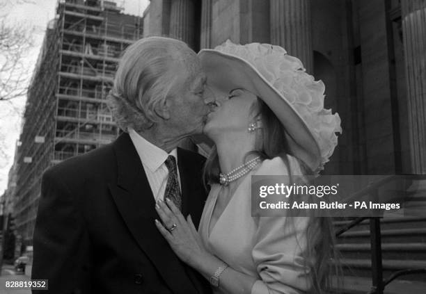 Sir Anthony Buck Conservative MP for Colchester North with his bride, Spanish fashion designer Bienvenida Perez-Blance after their marriage at St...