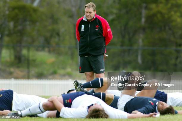 Wales' Coach Steve Hansen watches over his players during training at the Canberra Raiders training fields, ahead of their Rugby World Cup match...