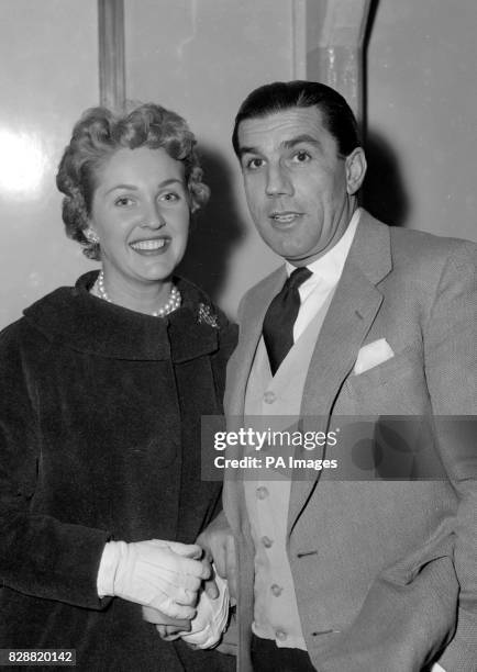 Katie Boyle, actress and television personality, and her husband, Lloyd's underwriter and recehorse owner Greville Baylis, are pictured at London...