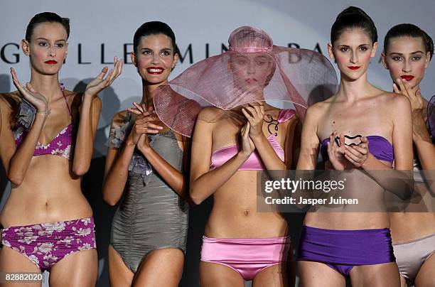 Models applaud wearing creations by Guillermina Baeza at the end of their fashion show during the Cibeles Madrid Fashion Week Spring/Summer 09 at the...