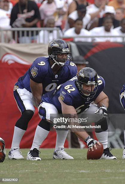 Baltimore Ravens quarterback Steve McNair takes a snap from center Mike Flynn against the Tampa Bay Buccaneers September 10, 2006 in Tampa. The...