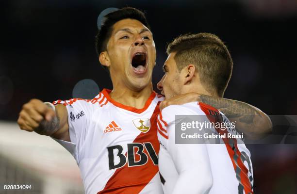 Lucas Alario of River Plate and Enzo Nicolas Perez of River Plate celebrate their team's first goal during a second leg match between River Plate and...