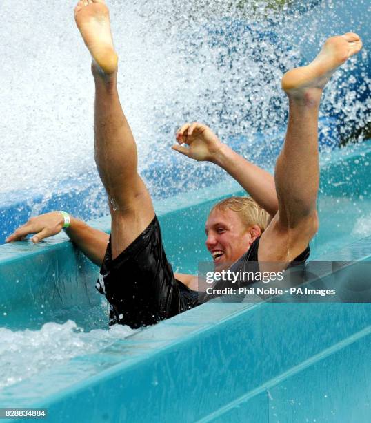 England rugby player Lewis Moody slides down a water chute during a team trip to the 'Wet and Wild' water park near Brisbane's Gold Coast. England...