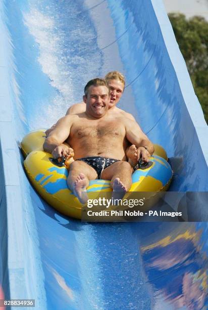 England rugby players Jason Leonard and Josh Lewsey slide down a water chute during a team trip to the 'Wet and Wild' water park near Brisbane's Gold...