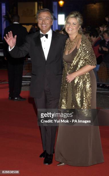 Des O'Connor and wife Jodie arrive for the annual National Television Awards at the Royal Albert Hall in central London. *23/03/04: The showbiz...