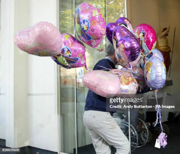 Balloons arrive for Sir Paul McCartney and Heather Mills' new baby girl Beatrice Millie at St John & Elizabeth Hospital in St Johns Wood, north...