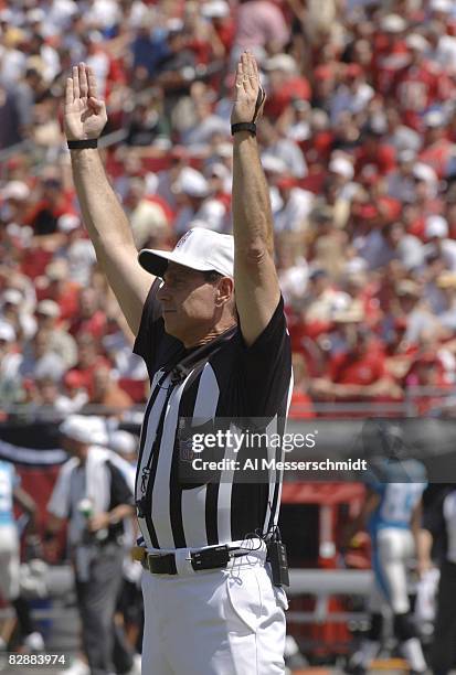 Referee Tony Corrente signals a score as the Tampa Bay Buccaneers host the Carolina Panthers September 24, 2006 in Tampa. The Panthers defeated the...
