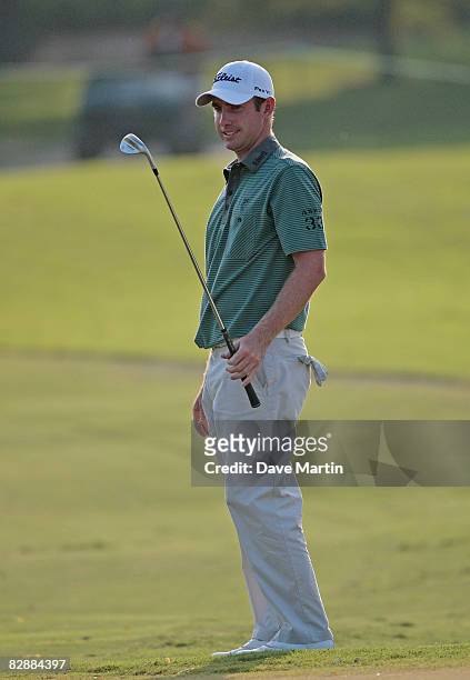 Andrew Buckle of Australia watches his chip to the 9th hole during first round play in the Viking Classic at the Annandale Golf Club on September 18,...