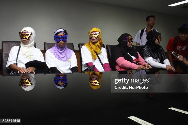 International human trafficking victims, who were rescued were also presented at a press conference at the Indonesian National Police Criminal...