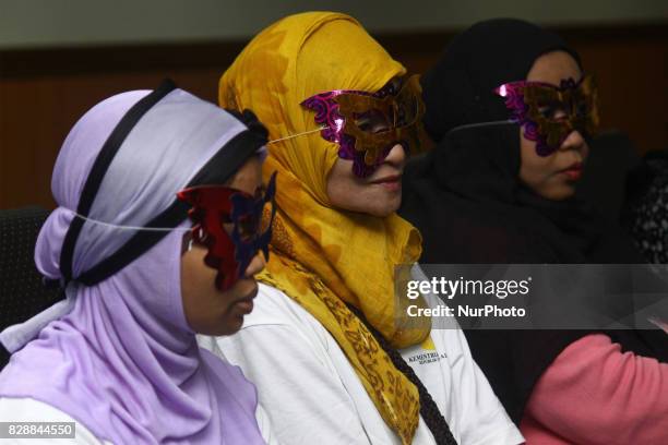 International human trafficking victims, who were rescued were also presented at a press conference at the Indonesian National Police Criminal...