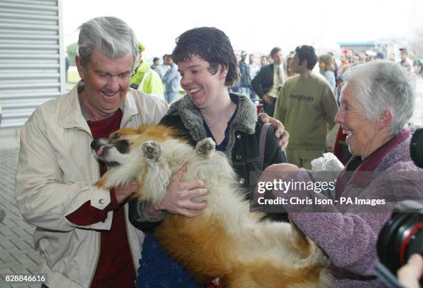 Heather McCourt and her corgi Toby are reunited her parents as they disembark from P&O's flagship Aurora in Southampton, after a 17-day cruise around...