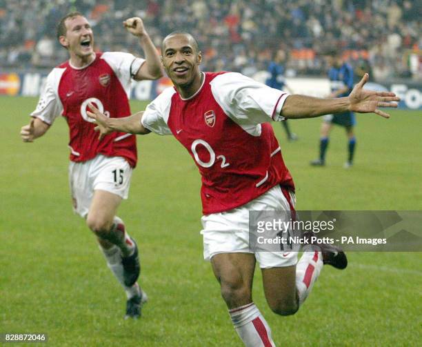 Arsenal's Thierry Henry celebrates his 2nd goal against Inter Milan with Ray Parlour as Arsenal beat Inter 5-1, during their UEFA Champions League...