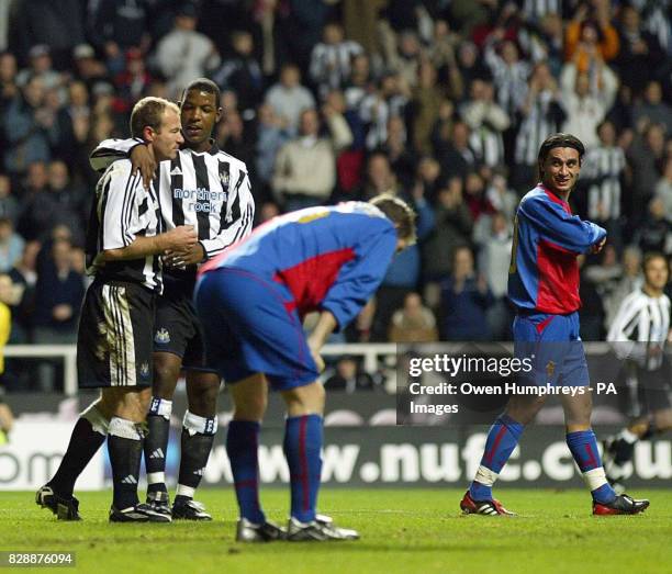 Newcastle Utd's Alan Shearer is congratulated after FC Basel's Julio Hernan Rossi scored an own goal, during the UEFA Cup 2nd round 2nd leg match at...