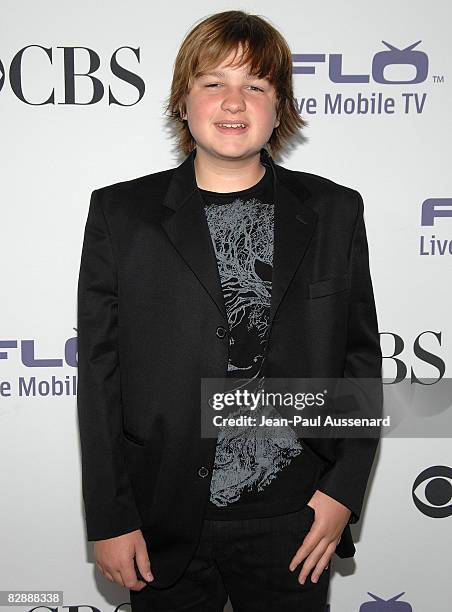 Actor Angus T. Jones arrives at the CBS Comedies season premiere party held at Area on September 17, 2008 in Los Angeles, California.