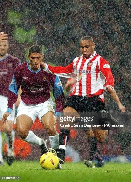 West Ham United's Hayden Mullins in action with Jeff Whitley of Sunderland, during the Nationwide Division One match at Upton Park, London, Saturday...