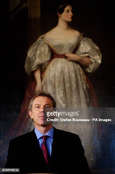 Prime Minister Tony Blair stand in front of Augusta Ada Byron, Countess of Lovelace, by Margaret Carpenter, during a press conference at Downing...